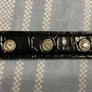 Designer black faux crocodile leather belt.